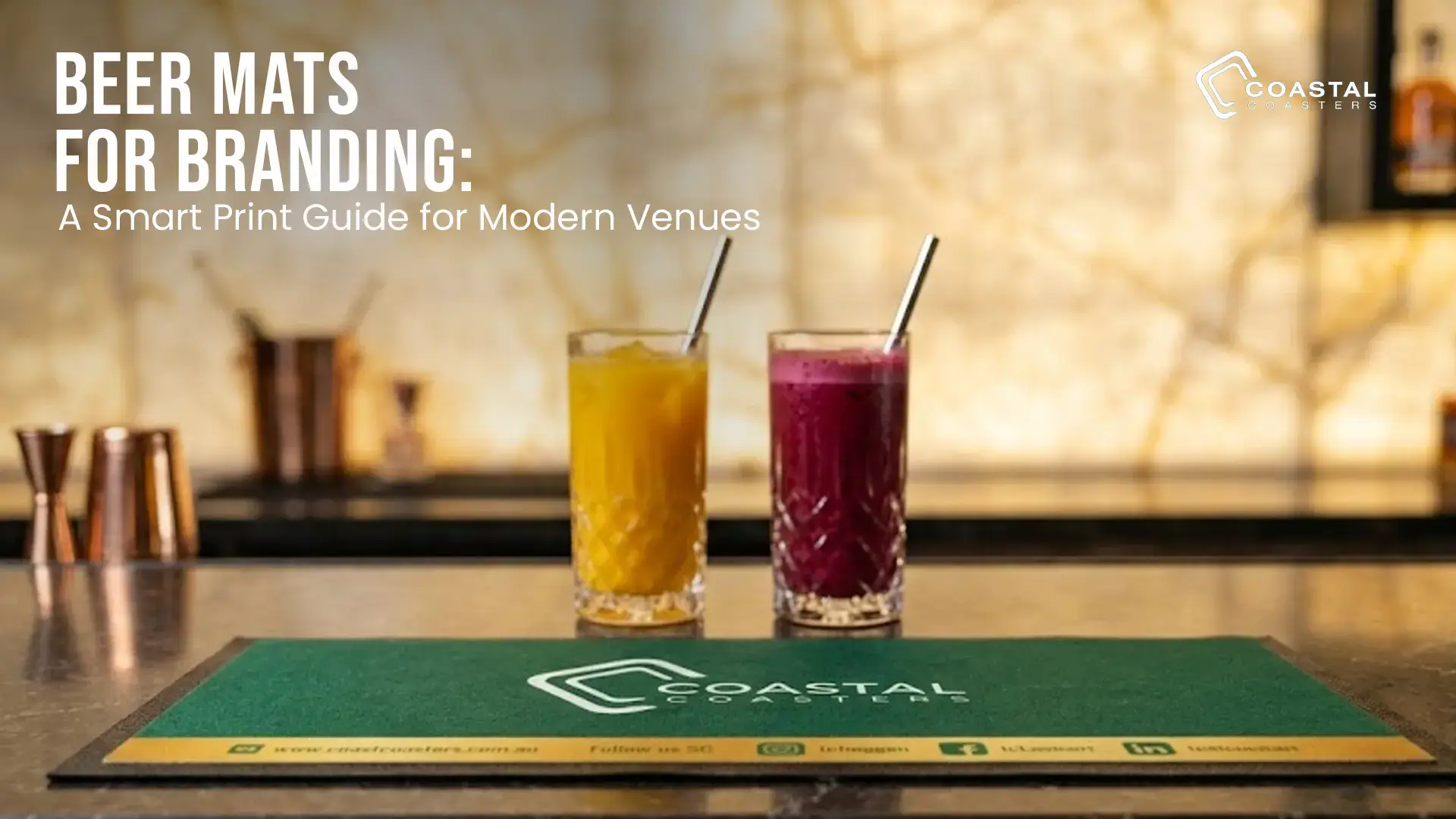 Green Coastal Coasters branded beer mat displayed on a modern bar counter with two colorful drinks in the background.